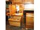 Custom wood cabinet with mixer, pull down shelf and storage drawer at 10991 E Vassar Dr, Aurora, CO 80014