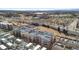 Aerial view of apartment buildings, highways, and surrounding city landscape at 1438 Little Raven St # 407, Denver, CO 80202