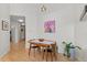 Dining area with hardwood floors, modern furniture, and ample lighting at 1438 Little Raven St # 407, Denver, CO 80202