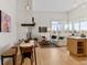 Bright living room with hardwood floors, modern furniture, and a view at 1438 Little Raven St # 407, Denver, CO 80202
