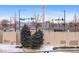 Scenic view features cityscape including bridges, skyline, and snowy foreground at 1438 Little Raven St # 407, Denver, CO 80202