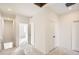 Bright hallway with doors to other rooms and stairs at 14586 W 91St Ave # B, Arvada, CO 80005