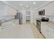 Kitchen with stainless steel appliances and light-colored cabinets at 18986 E 51St Pl, Denver, CO 80249