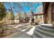 Large backyard with patio and mature trees at 1325 Clermont St, Denver, CO 80220