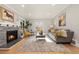 Bright living room with fireplace and hardwood floors at 1325 Clermont St, Denver, CO 80220