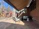 Patio with retractable awning and seating at 1325 Clermont St, Denver, CO 80220