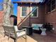 Relaxing patio with seating area and fire pit at 1325 Clermont St, Denver, CO 80220