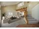 Spacious living room with high ceilings, a beautiful staircase, and views into the dining room at 5 Ronnie Rd, Golden, CO 80403