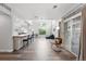 Open-concept floor plan featuring a living room, dining room, kitchen, and high ceilings at 10010 E Gunnison Pl # 707, Aurora, CO 80247