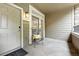 Inviting outdoor patio with a chair and a sliding glass door, perfect for relaxation at 10010 E Gunnison Pl # 707, Aurora, CO 80247