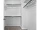 Walk-in closet with shelving and rods at 10010 E Gunnison Pl # 707, Aurora, CO 80247