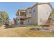 Two-story house featuring an open deck and backyard landscaping and a low-maintenance yard at 338 Sage Grouse Cir, Castle Rock, CO 80109