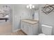 Basement bathroom features a sink vanity, toilet, and modern fixtures at 338 Sage Grouse Cir, Castle Rock, CO 80109