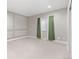 Neutral bedroom with panel molding, a window with drapes, and carpet at 338 Sage Grouse Cir, Castle Rock, CO 80109