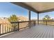 Relax on this spacious deck with picturesque views of the surrounding landscape and mountain at 338 Sage Grouse Cir, Castle Rock, CO 80109