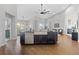 Kitchen island with stainless steel dishwasher, farmhouse sink and open layout at 338 Sage Grouse Cir, Castle Rock, CO 80109