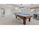 Spacious recreation room with a pool table, entertainment area, and lots of natural light at 338 Sage Grouse Cir, Castle Rock, CO 80109