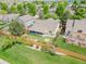 Beautiful aerial view of the home showcasing the backyard and lush landscaping at 10877 W 55Th Ln, Arvada, CO 80002