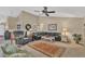 Spacious living room with comfortable seating and open layout at 10877 W 55Th Ln, Arvada, CO 80002