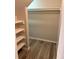 Large, organized walk-in closet with shelving, great for storage at 8307 E 14Th Ave, Denver, CO 80220