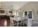 Lovely dining room with large table and view of the outdoor patio at 819 Meadow Ln, Palmer Lake, CO 80133