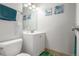 Fresh bathroom features a vanity with a mirror, drawers and under sink storage, and marine-themed decor at 2281 S Vaughn Way # 316A, Aurora, CO 80014
