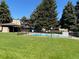 Community pool, gazebo, and lush lawn provide a relaxing outdoor space at 2281 S Vaughn Way # 316A, Aurora, CO 80014