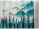 Close-up of a shower curtain with a green and blue mountain scene at 2281 S Vaughn Way # 316A, Aurora, CO 80014