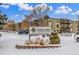 Community sign for Torrey Pines at Heather Ridge Condominiums with building in the background at 2281 S Vaughn Way # 316A, Aurora, CO 80014