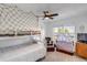 Charming bedroom featuring a bunk bed with net and ceiling fan at 255 Divide View Dr, Golden, CO 80403