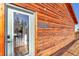 Charming exterior view of a wood-sided house with a modern glass door at 255 Divide View Dr, Golden, CO 80403