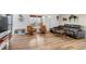 Stylish living room with hardwood floors, modern furniture, and expansive windows at 255 Divide View Dr, Golden, CO 80403