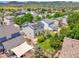 Aerial view of homes featuring solar panels, nice backyards, and mountain views at 9595 Elk Mountain Cir, Littleton, CO 80125