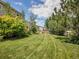 Spacious backyard with lawn and perimeter landscaping at 9595 Elk Mountain Cir, Littleton, CO 80125