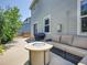 Back patio featuring a fire pit, outdoor seating, and easy access to the yard at 9595 Elk Mountain Cir, Littleton, CO 80125