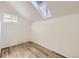 Bedroom with skylight offering plenty of natural light, creating a serene atmosphere at 8925 Oakwood St, Westminster, CO 80031