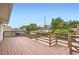 Large, private wooden deck overlooking the backyard with railings at 8925 Oakwood St, Westminster, CO 80031
