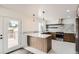 Modern kitchen features stainless steel appliances, sleek countertops, and contemporary design at 8925 Oakwood St, Westminster, CO 80031
