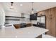 Well-appointed kitchen with stainless steel appliances, quartz countertops, and stylish cabinetry at 8925 Oakwood St, Westminster, CO 80031