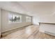 Spacious living room with lots of natural light and modern flooring throughout at 8925 Oakwood St, Westminster, CO 80031