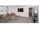 Spacious living room with natural light, plush seating, and modern decor at 2080 E 84Th Ave, Denver, CO 80229