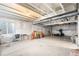 Spacious unfinished basement, offering potential for customization and storage at 3074 Kestrel St, Brighton, CO 80601