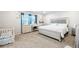 Serene bedroom featuring a stylish bed, coordinated furnishings, and soft window light for a restful retreat at 3074 Kestrel St, Brighton, CO 80601