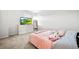 Comfortable bedroom with TV, dresser and closet mirror at 3074 Kestrel St, Brighton, CO 80601