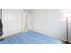 Cozy bedroom featuring plush carpet and closet space for storage at 3074 Kestrel St, Brighton, CO 80601