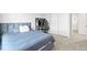 Bedroom with plush carpet, a game setup, and closet space for storage at 3074 Kestrel St, Brighton, CO 80601