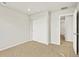 Bedroom featuring sliding closet doors and neutral carpet flooring at 17120 E 90Th Pl, Commerce City, CO 80022