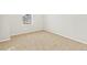 Bedroom with a window with blinds and neutral colored carpet at 17120 E 90Th Pl, Commerce City, CO 80022
