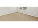 Bedroom with neutral carpet, a window with blinds, and base trim at 17120 E 90Th Pl, Commerce City, CO 80022
