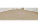 This hallway has neutral colored carpet and light-colored walls at 17120 E 90Th Pl, Commerce City, CO 80022